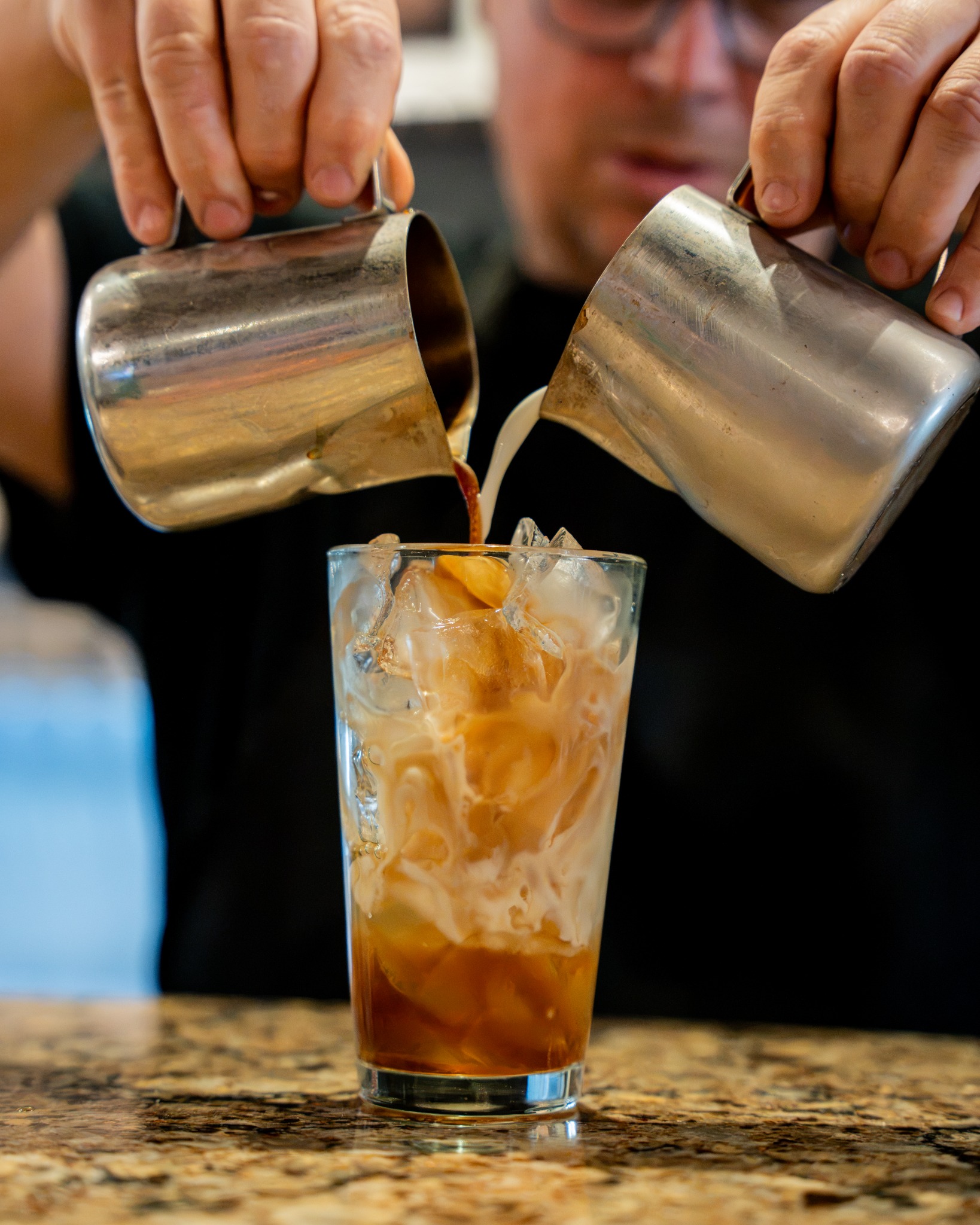Iced coffee being poured at The Pioneer Bakery Cafe