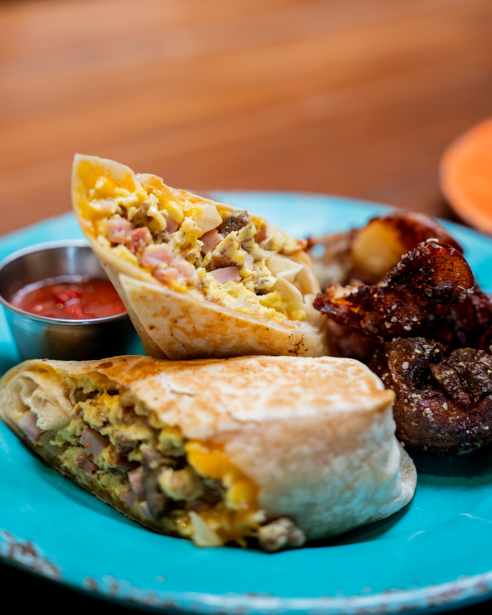 Breakfast burrito served with Pioneer potatoes