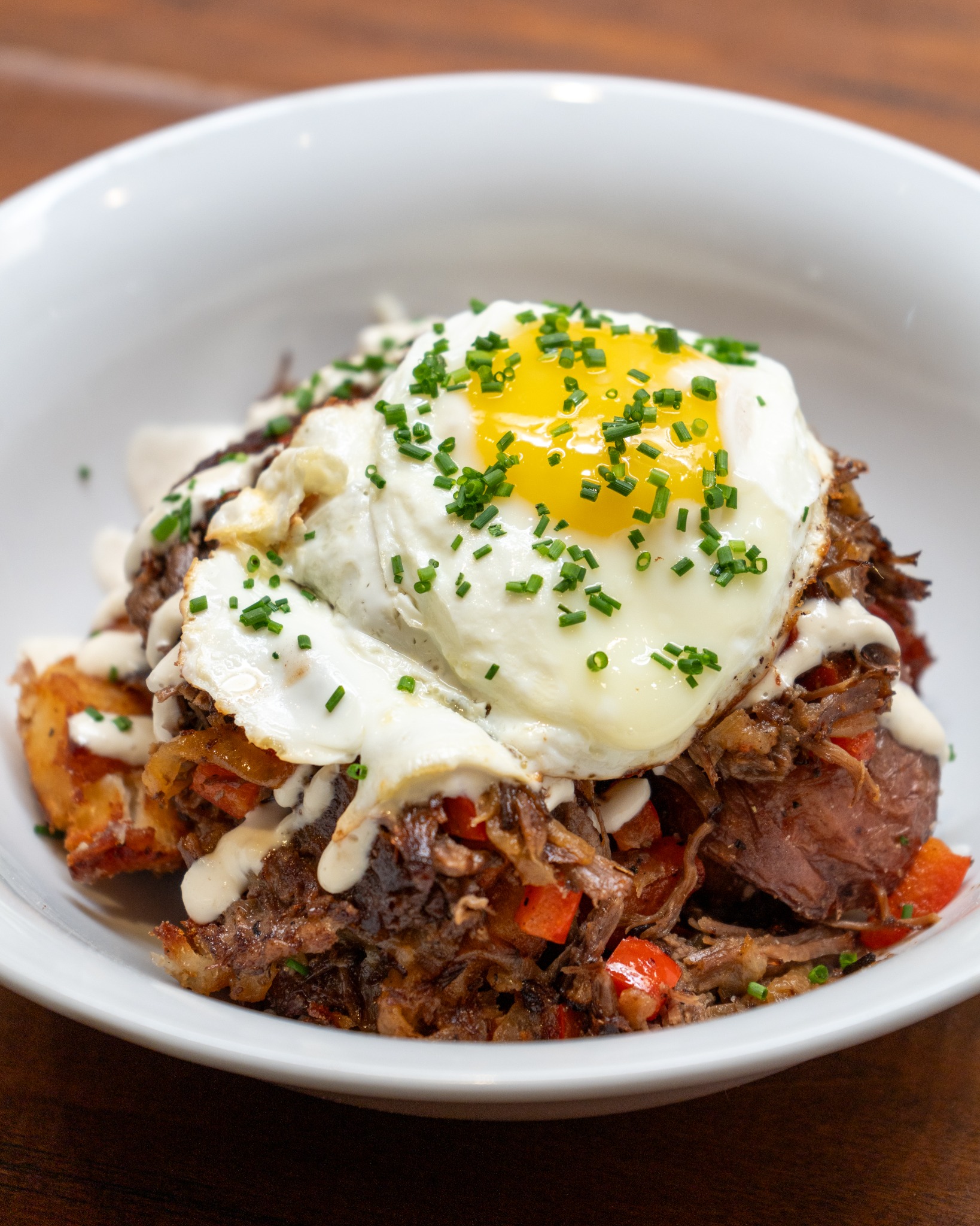 Signature Pioneer hash bowl topped with egg