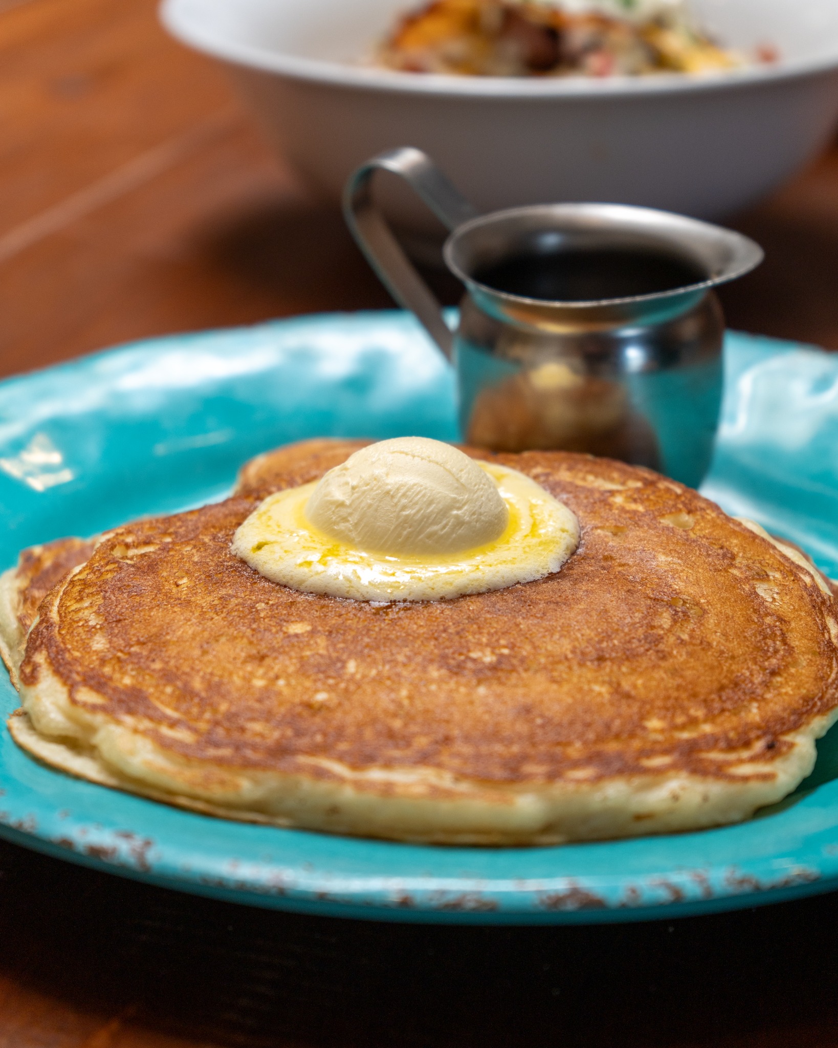Pioneer pancakes with butter and syrup